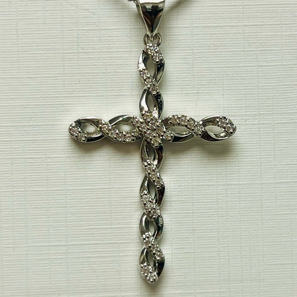 Twisted 14 K white gold over sterling silver cross with CZ